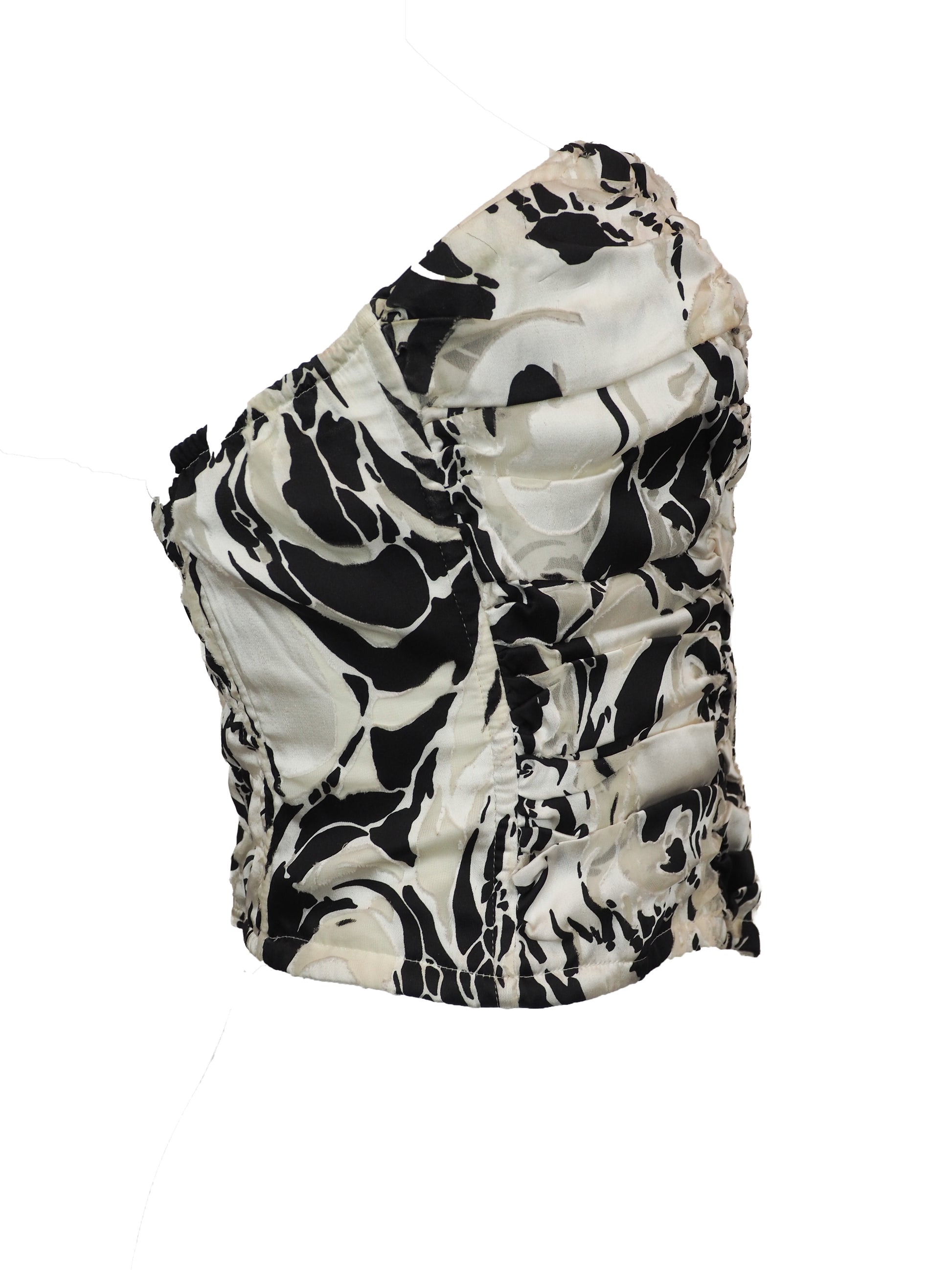 A vintage silk strapless sweetheart bustier top featuring a dramatic black and white abstract marbled pattern with heavy ruffle detailing