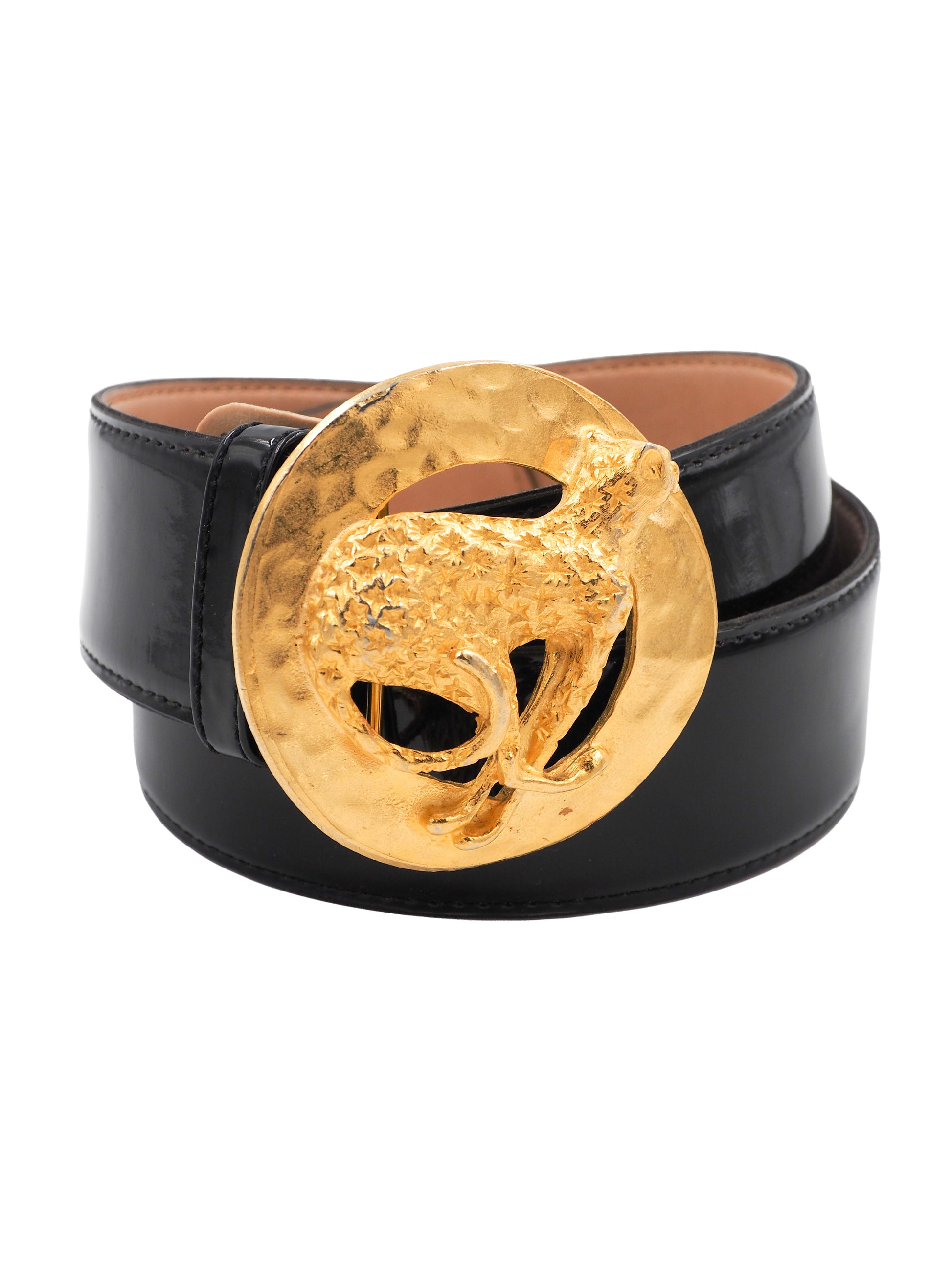 A vintage Gail labelle black leather belt with a large, textured gold buckle featuring a stylized animal motif