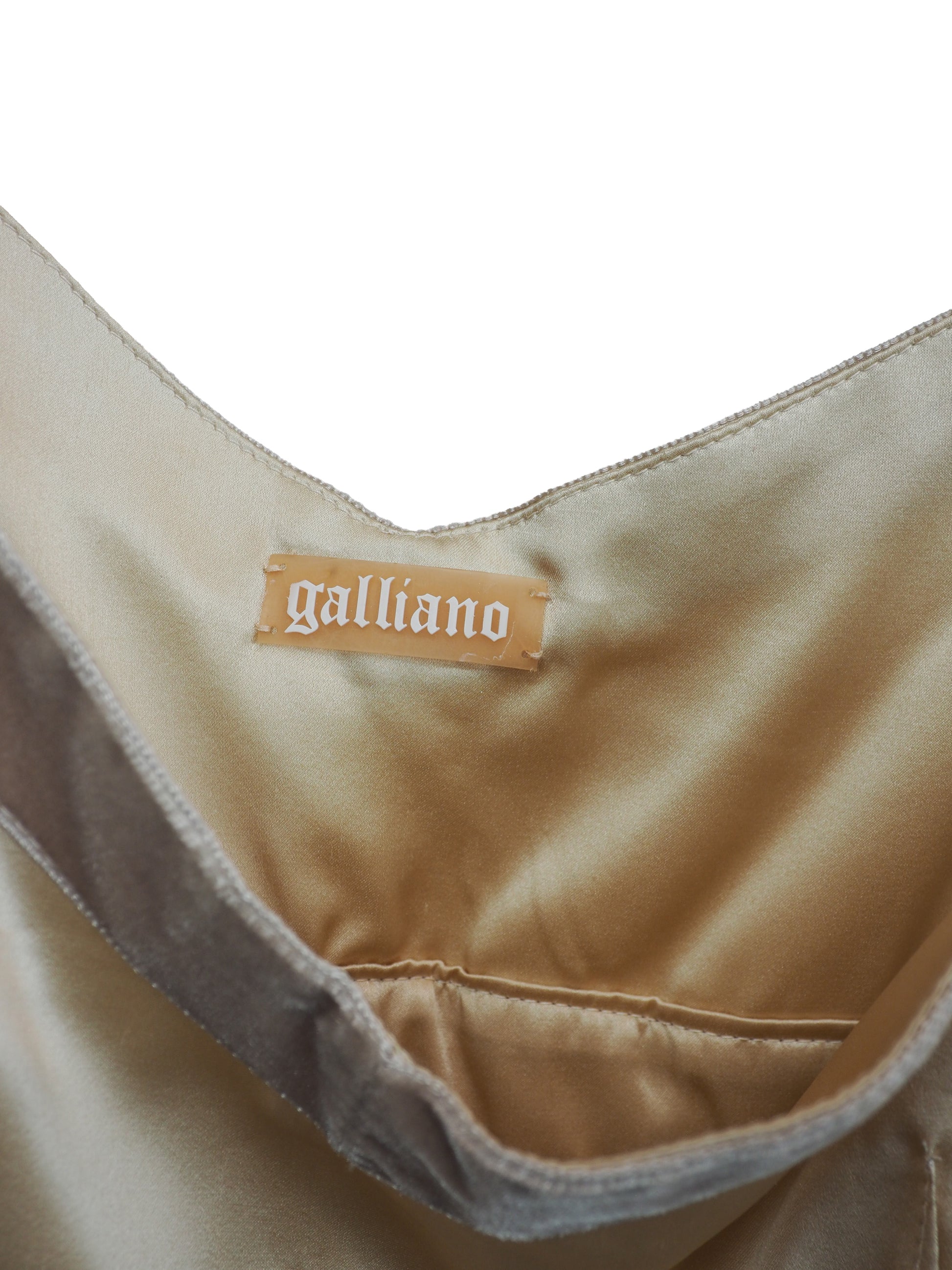 A vintage John galliano Y2K light beige satin camisole top with a V-neckline, thin shoulder straps, a decorative floral embroidered waistband, and pleated detailing on the front