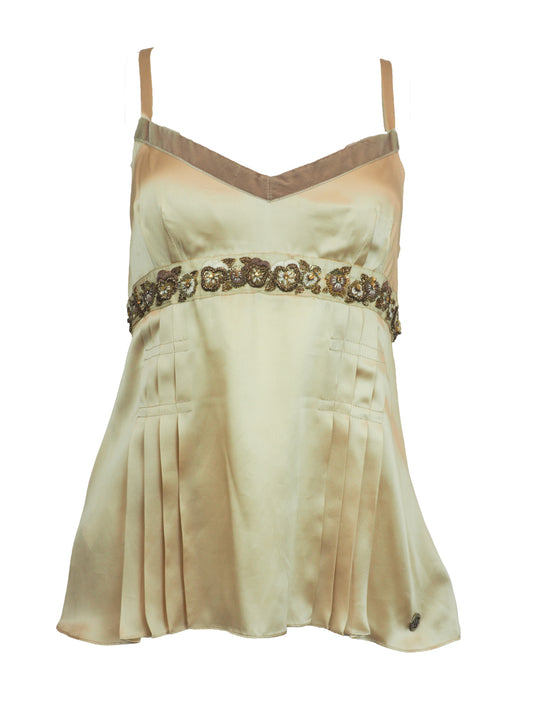 A vintage John galliano Y2K light beige satin camisole top with a V-neckline, thin shoulder straps, a decorative floral embroidered waistband, and pleated detailing on the front