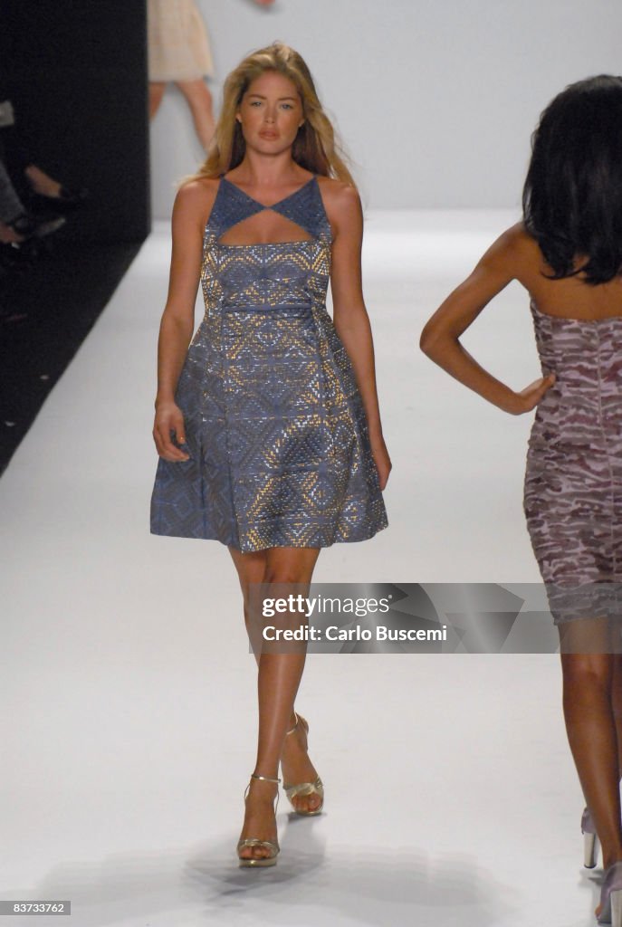 Bill Blass for Neiman Marcus Spring 2007 Mercedes Benz fashion week model wearing a blue metallic patterned dress on a runway