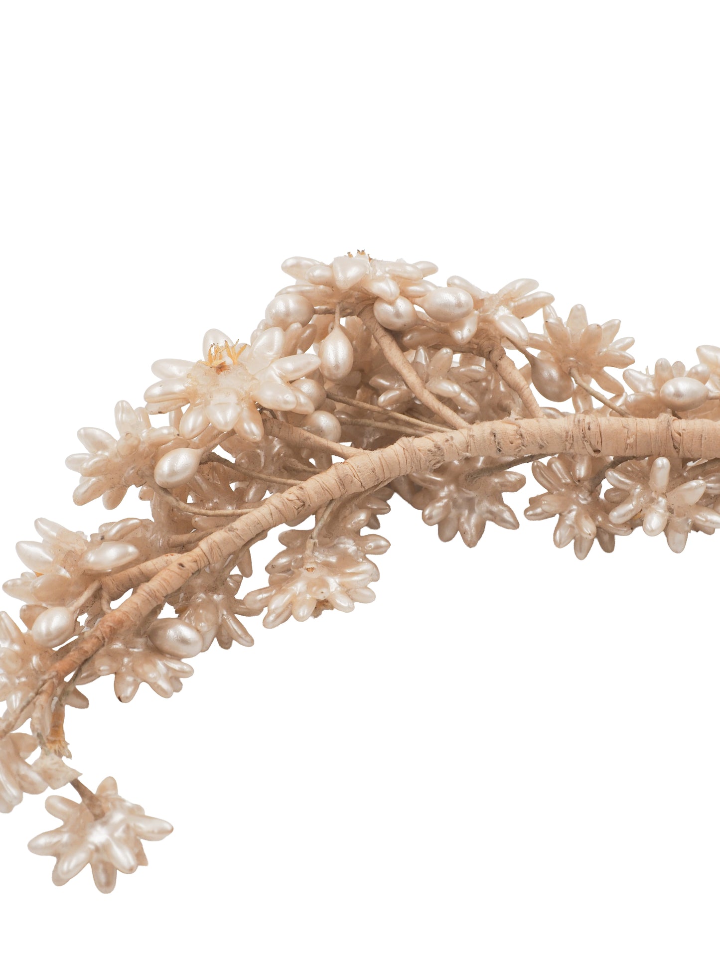 A vintage wedding delicate floral headband featuring small cream-colored faux flowers and branches
