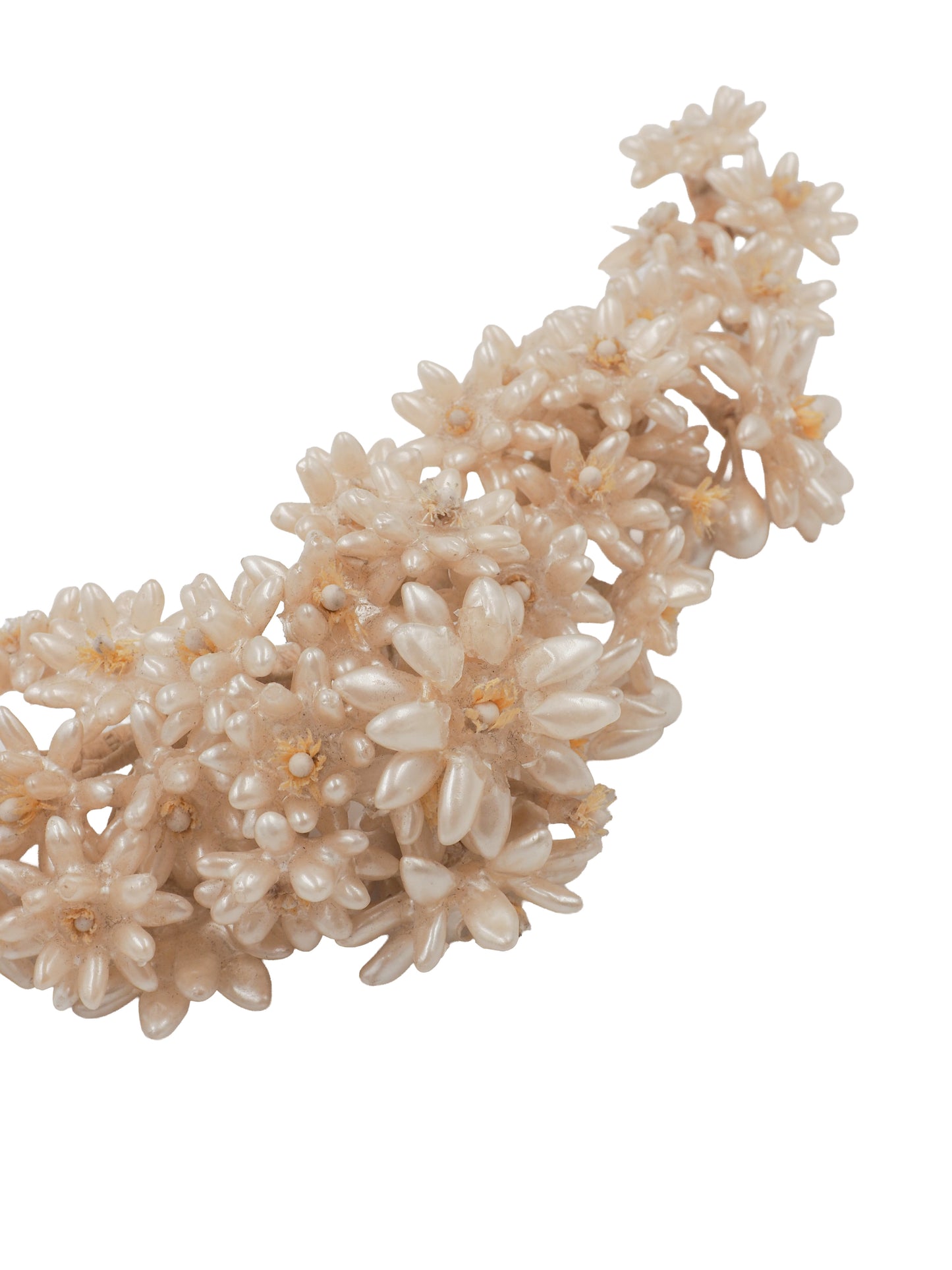 A vintage wedding delicate floral headband featuring small cream-colored faux flowers and branches