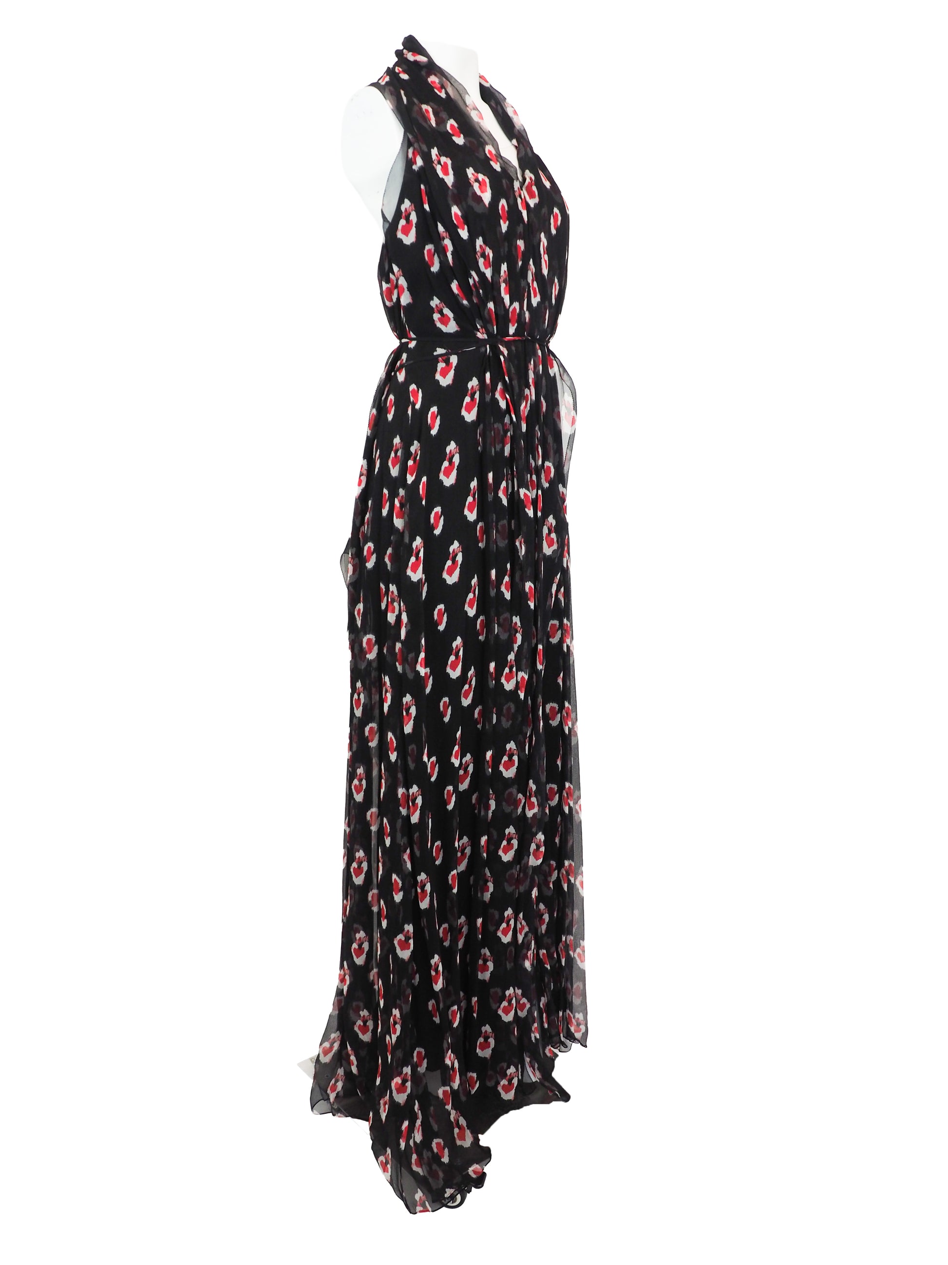 A vintage Carolina Herrera chiffon sleeveless black maxi dress with a red and pink floral print, featuring a halter-style neckline and a tie-waist detail, shown against a plain white background.