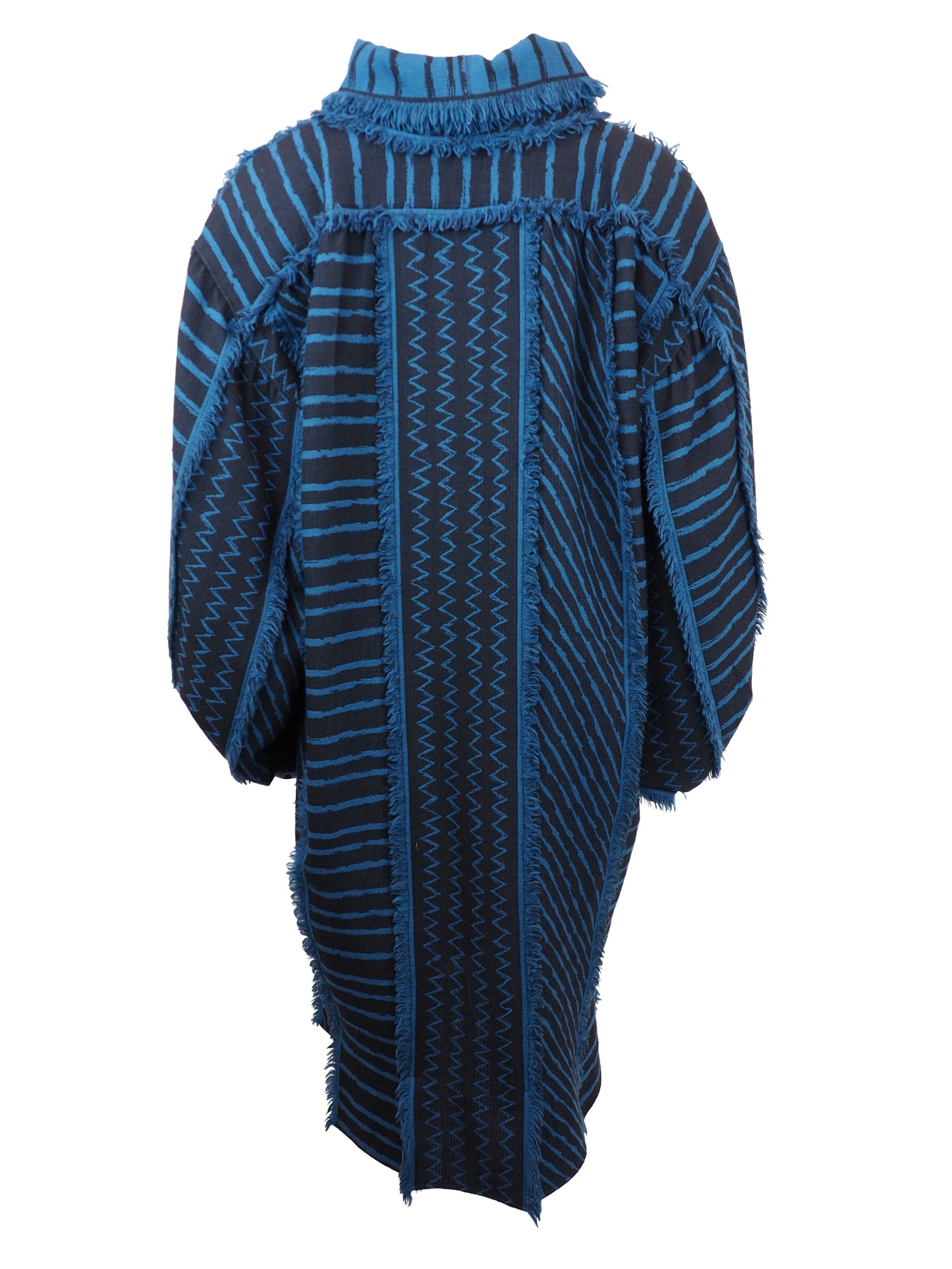 A vintage Issey Miyake long-sleeve, high-neck tunic top featuring a blue and black geometric pattern with fringed edges