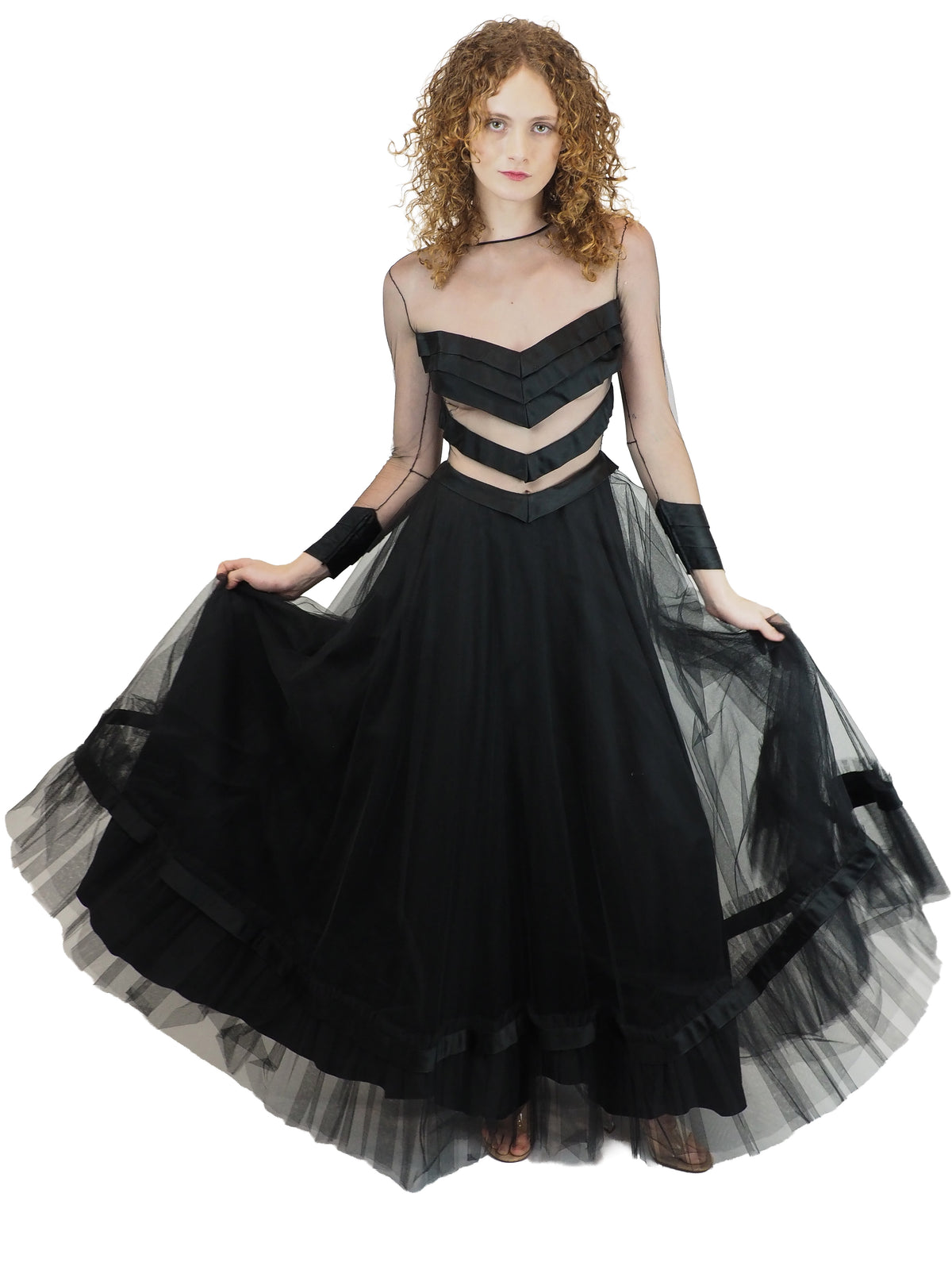 a vintage loris azzarro black strappy tulle formal gown with a sheer chevron satin bodice and layered tulle skirt
