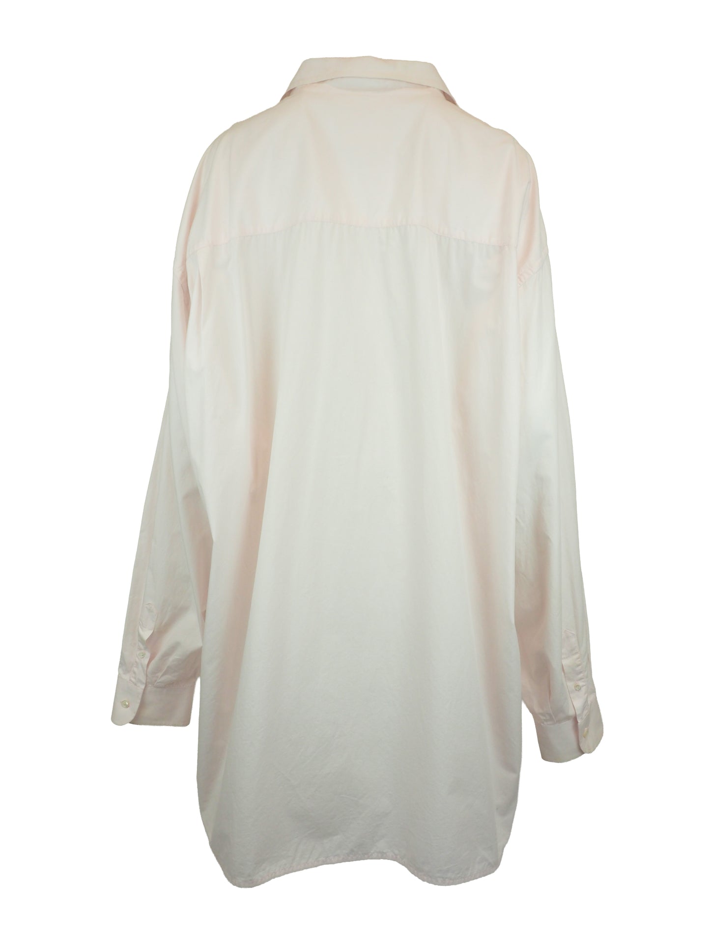 A vintage Maison Martin margiela 2001 pale blush pink oversized button-down shirt dress with a pointed collar, long sleeves, and a small black embroidered clover on the left chest