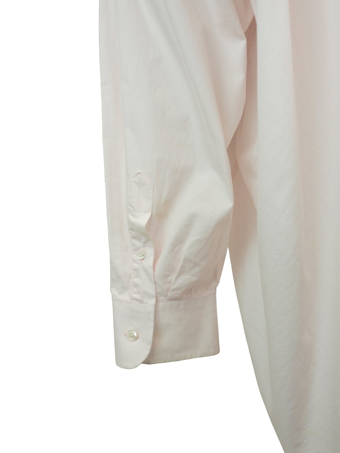 A vintage Maison Martin margiela 2001 pale blush pink oversized button-down shirt dress with a pointed collar, long sleeves, and a small black embroidered clover on the left chest