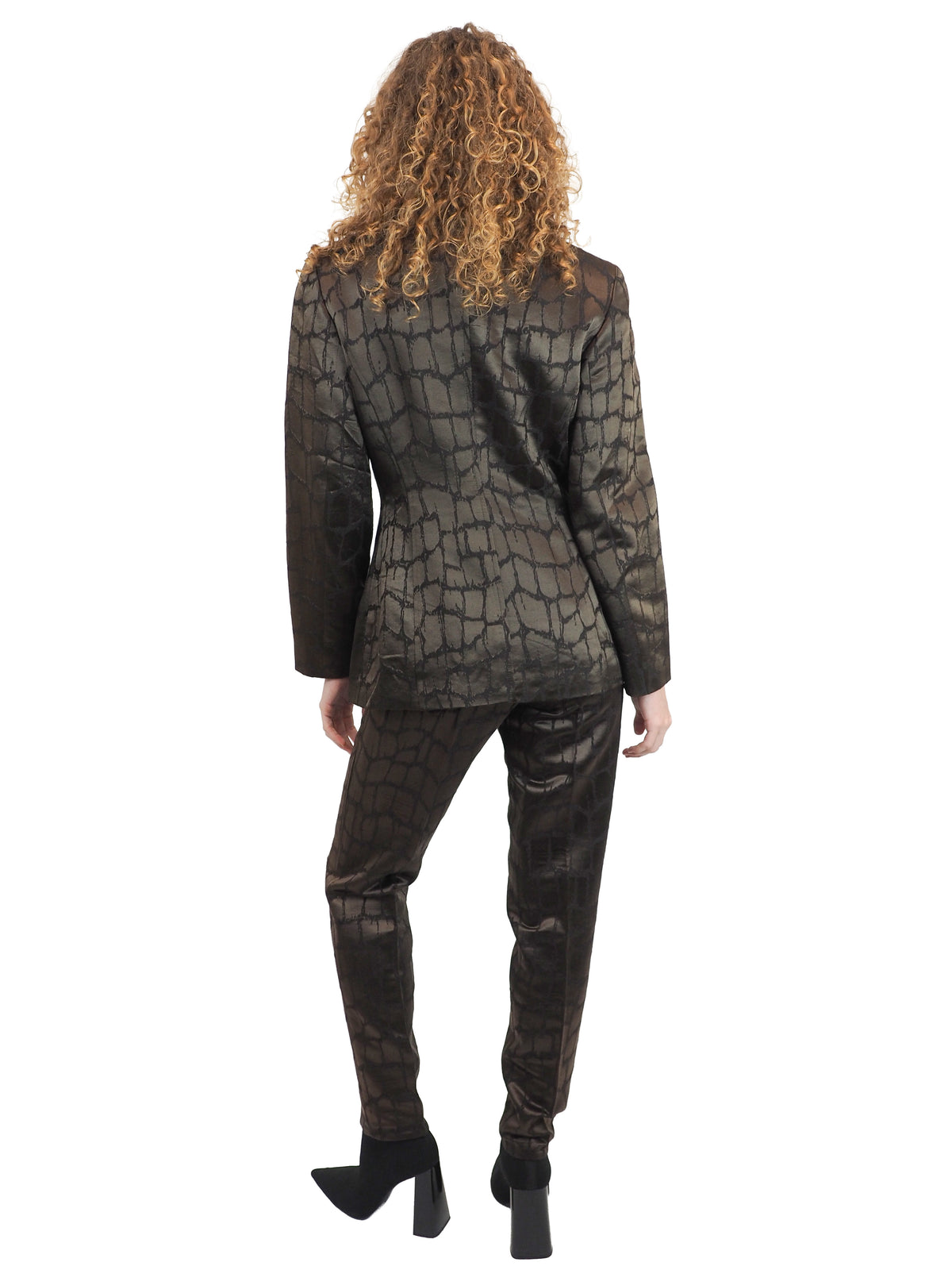 A vintage 1980's Mondi matching dark brown and black textured suit with a collared jacket, mini skirt and trousers