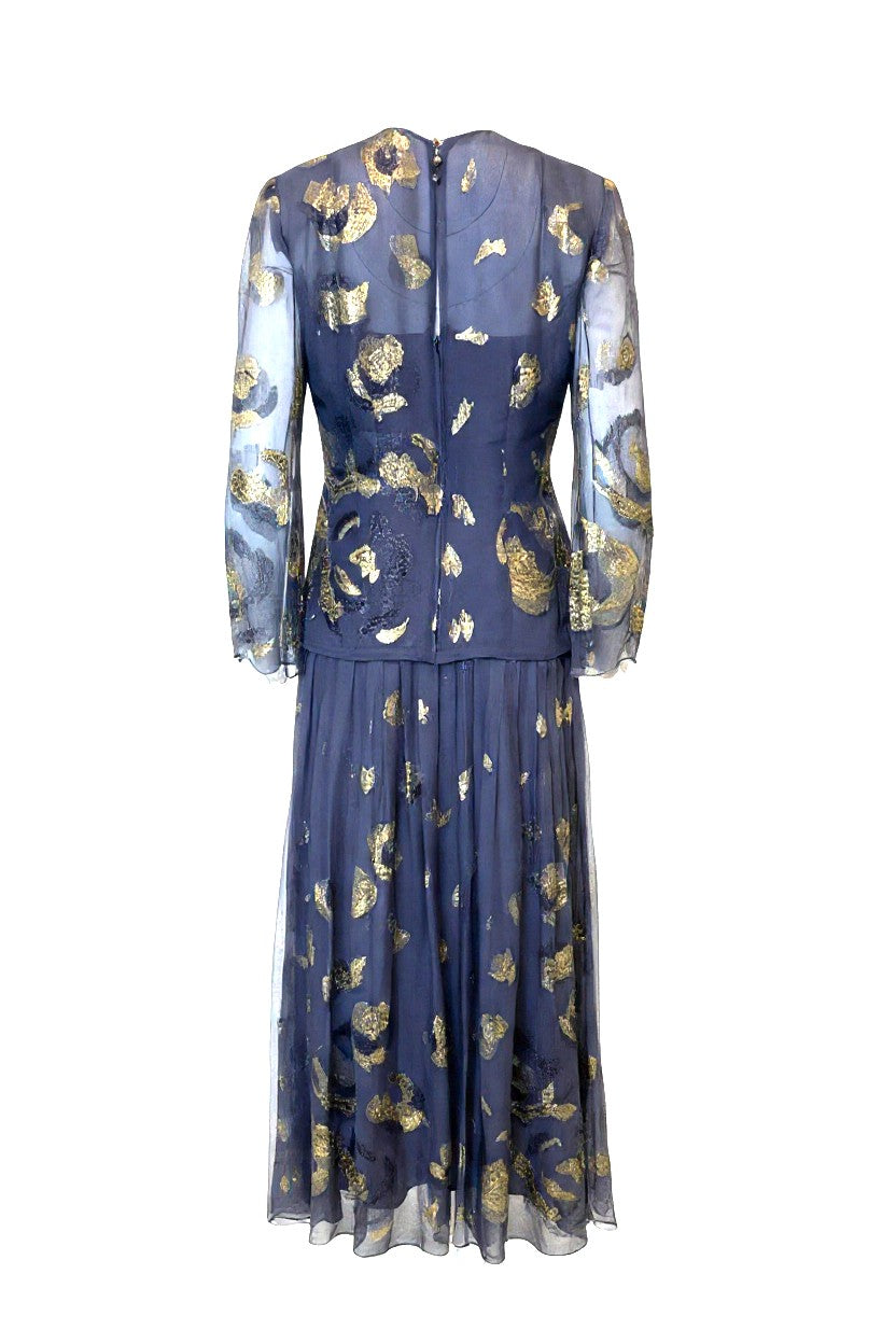 Lavender dress with gold floral patterns on a white background