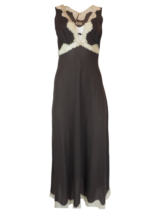 A vintage Emilio Pucci 1960s dark brown long-sleeved nightgown with cream lace trim along the edges, collar, and cuffs