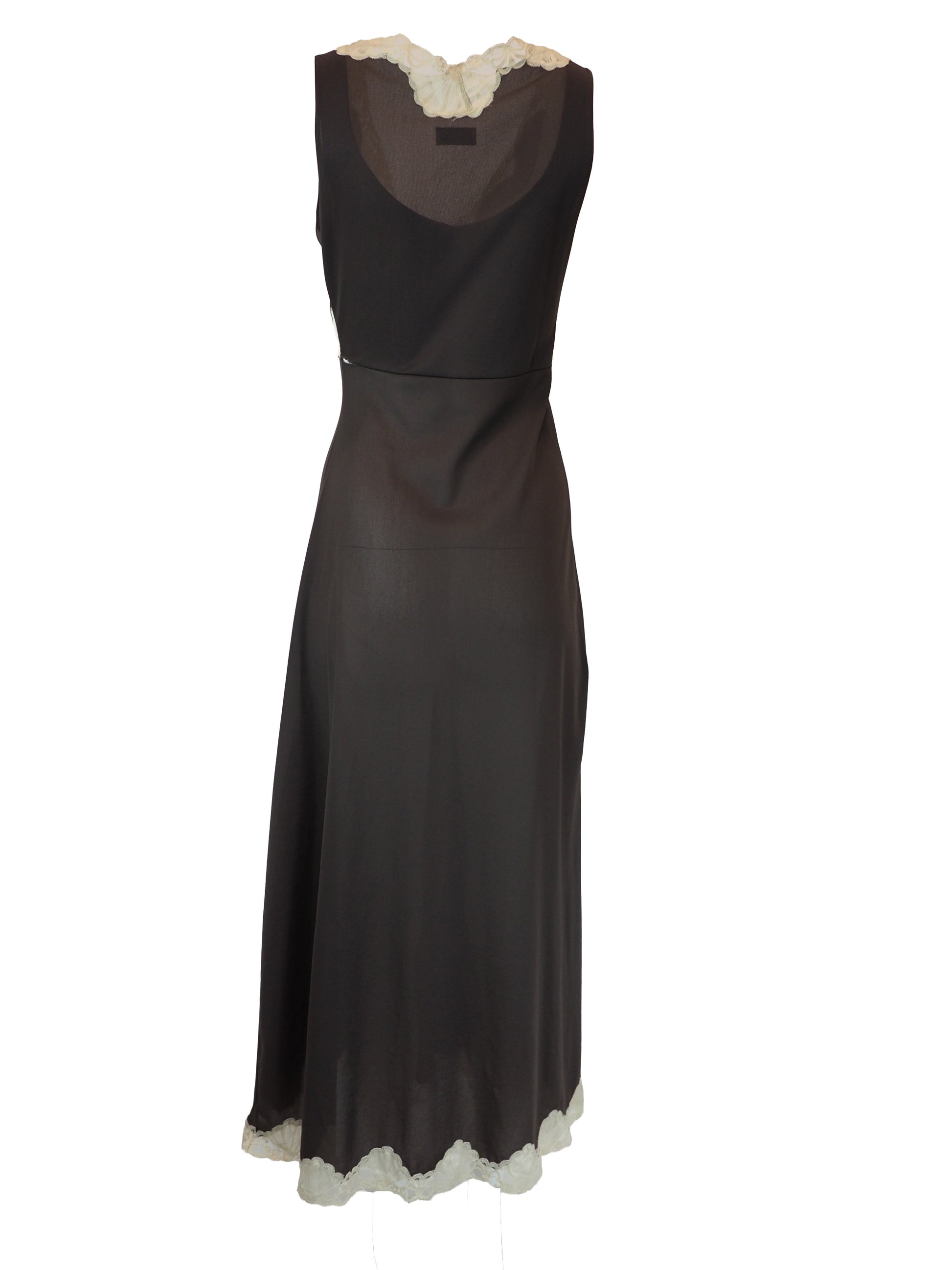 A vintage Emilio Pucci 1960s dark brown long-sleeved nightgown with cream lace trim along the edges, collar, and cuffs