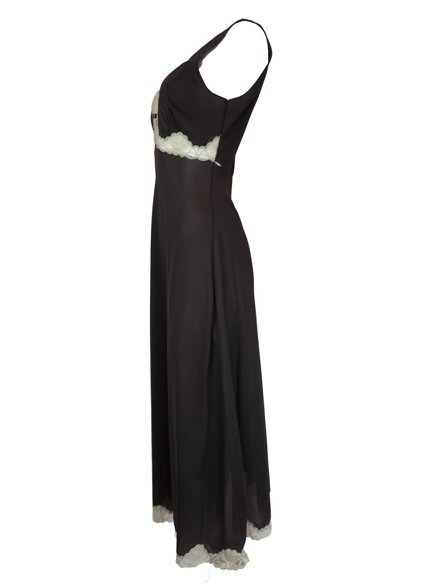 A vintage Emilio Pucci 1960s dark brown long-sleeved nightgown with cream lace trim along the edges, collar, and cuffs