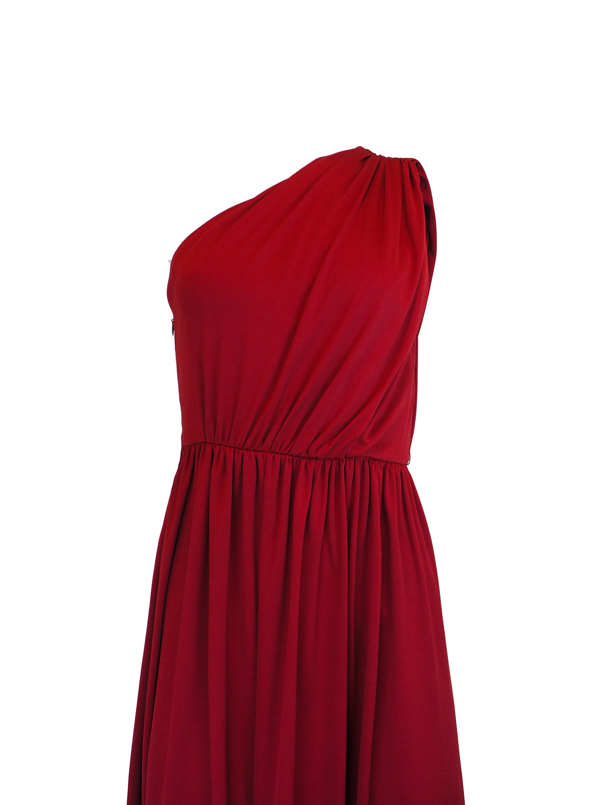 A vintage 1970s red one-shoulder maxi dress with a draped, wrap-style bodice and a matching waist tie