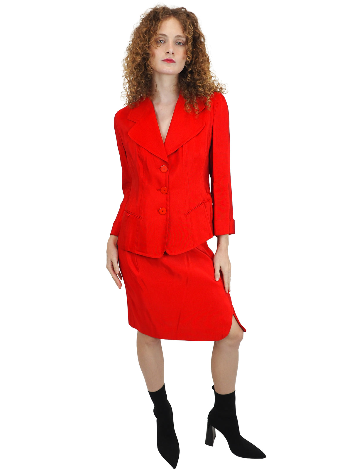 A vintage donna Karan bright red tailored blazer and matching skirt