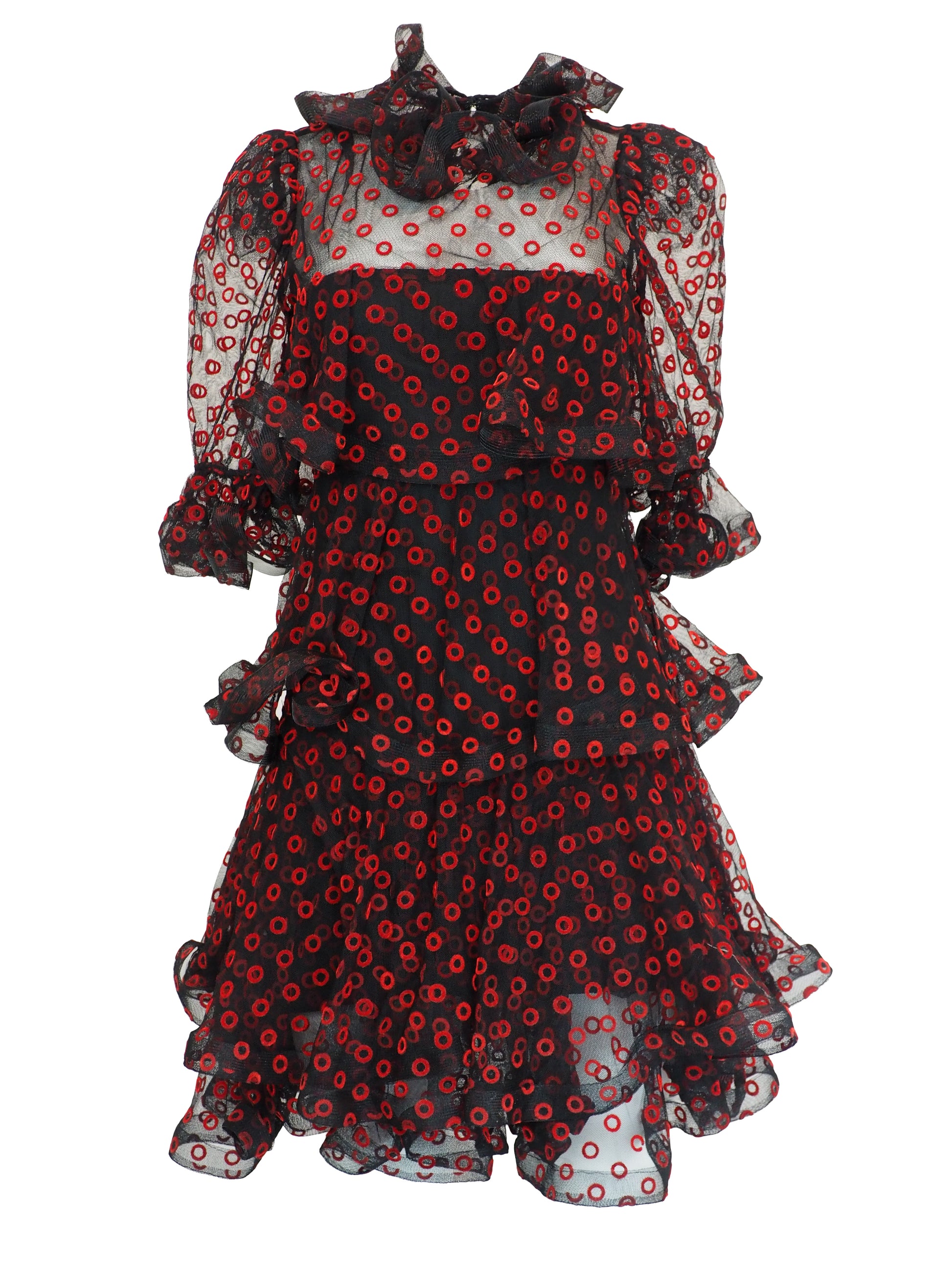 A vintage Arnold Scaasi designer black sheer mesh dress with a red and black poppy print, featuring a ruffled high neck, long puff sleeves, and a tiered ruffled skirt