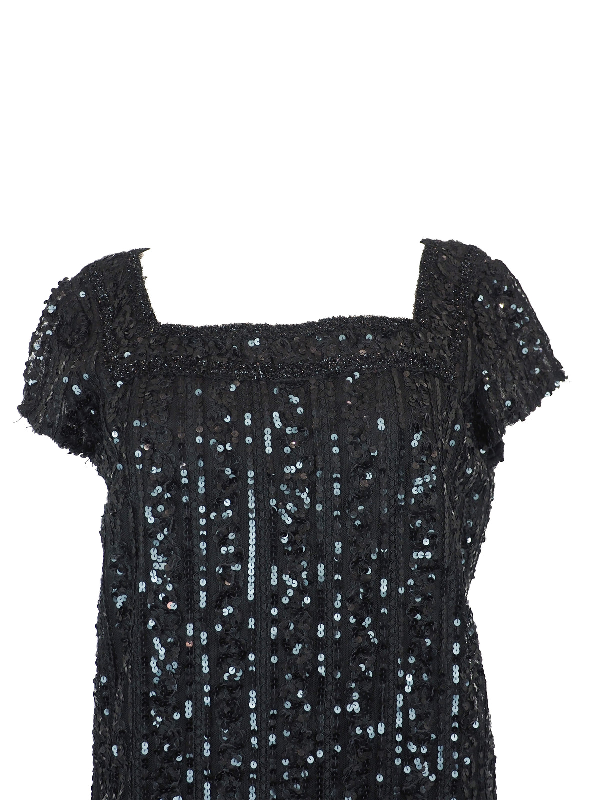 A vintage 1960s black sequined evening dress with short cap sleeves and a brown fox fur-trimmed hem