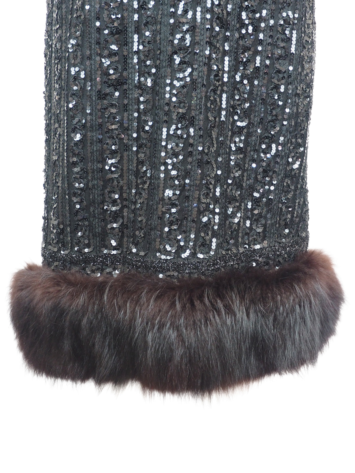 A vintage 1960s black sequined evening dress with short cap sleeves and a brown fox fur-trimmed hem