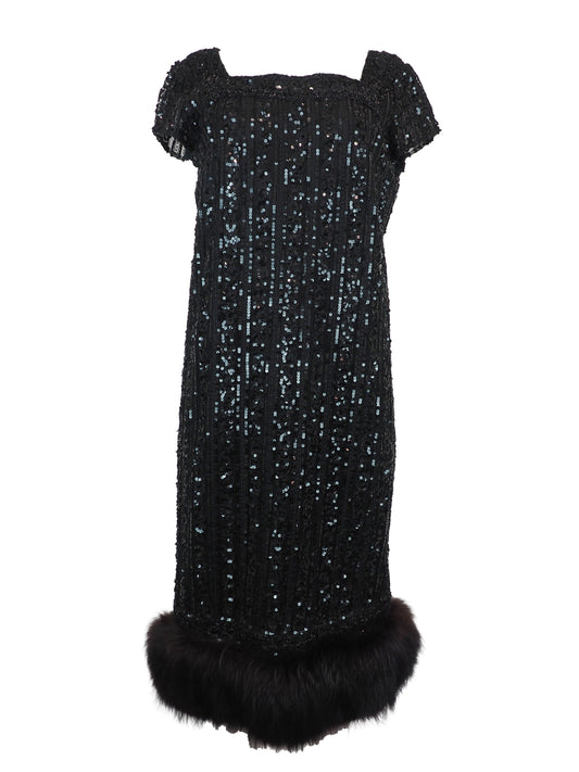 A vintage 1960s black sequined evening dress with short cap sleeves and a brown fox fur-trimmed hem