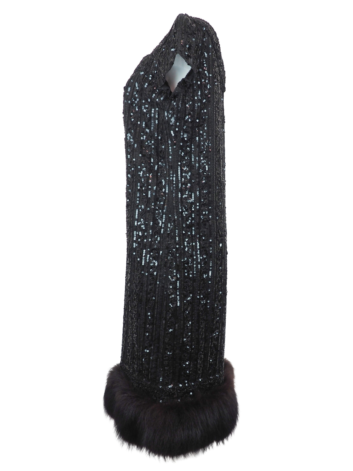 A vintage 1960s black sequined evening dress with short cap sleeves and a brown fox fur-trimmed hem