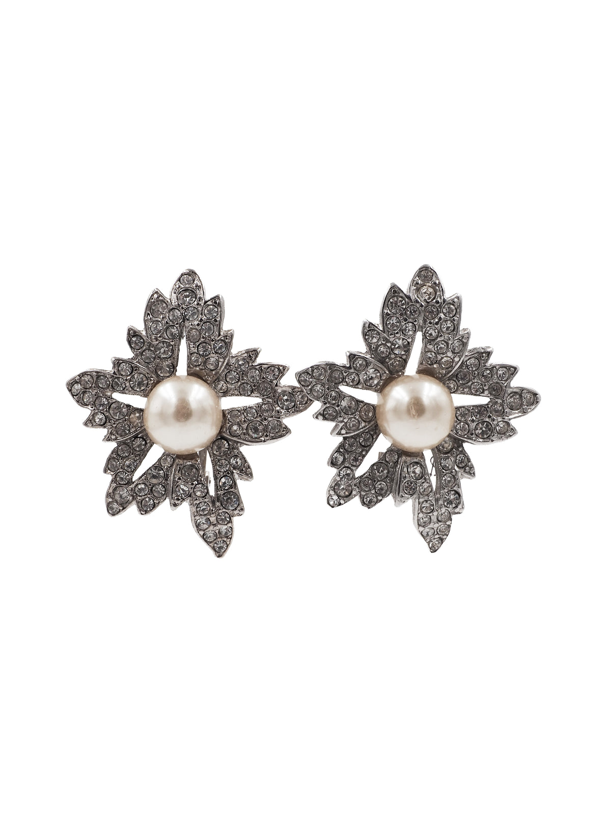 A pair of silver-toned leaf-shaped earrings with a central white pearl and pavé-set dark stones