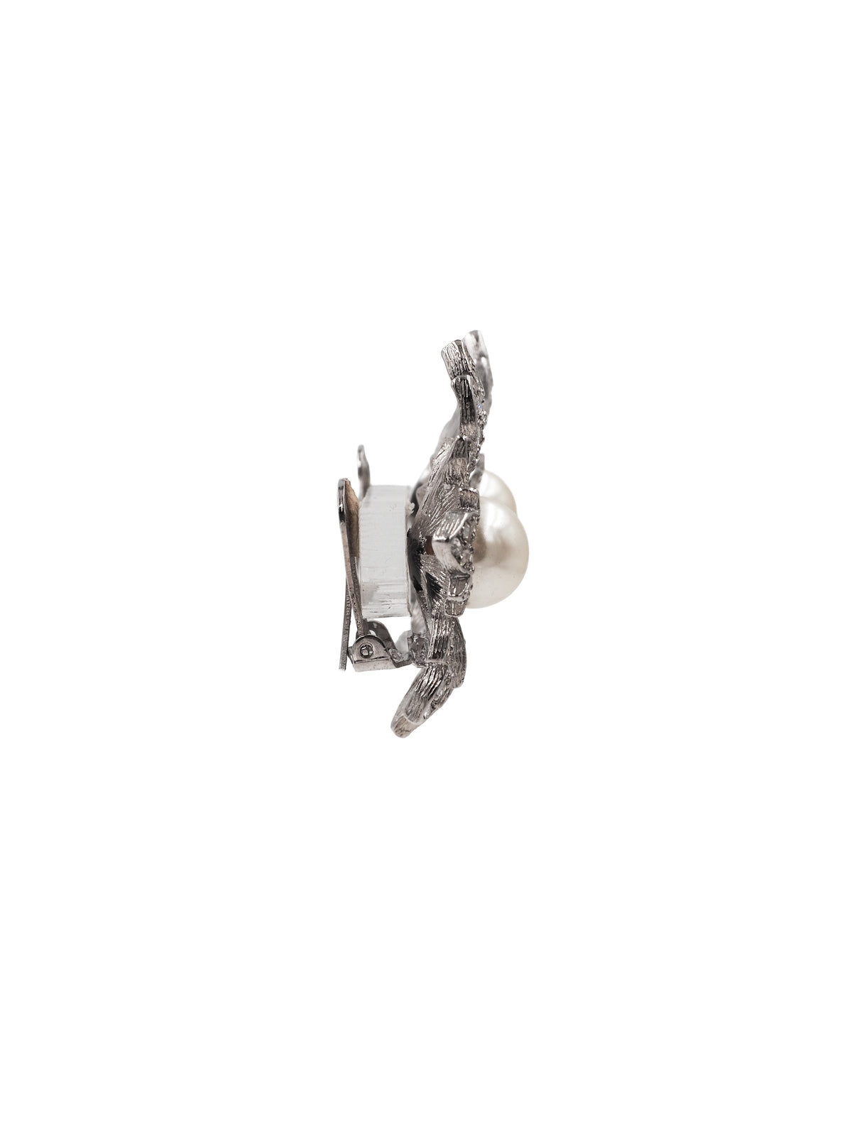 A pair of silver-toned leaf-shaped earrings with a central white pearl and pavé-set dark stones