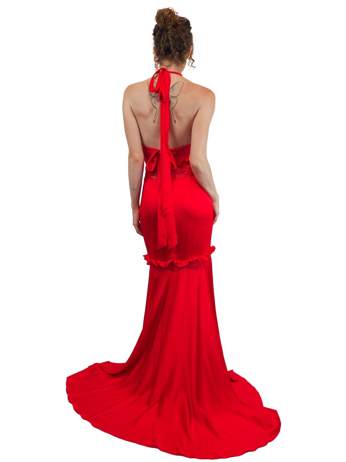 A vintage Valentino Y2K vibrant red silk halter-neck gown with lace detailing on the bodice and waist