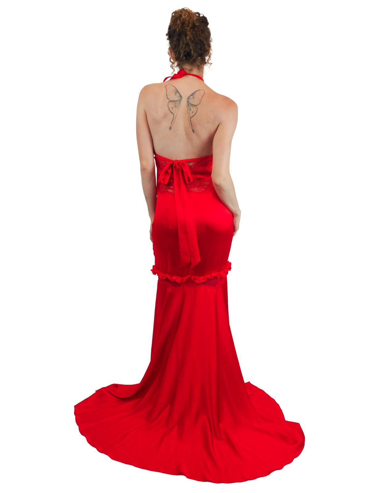 A vintage Valentino Y2K vibrant red silk halter-neck gown with lace detailing on the bodice and waist