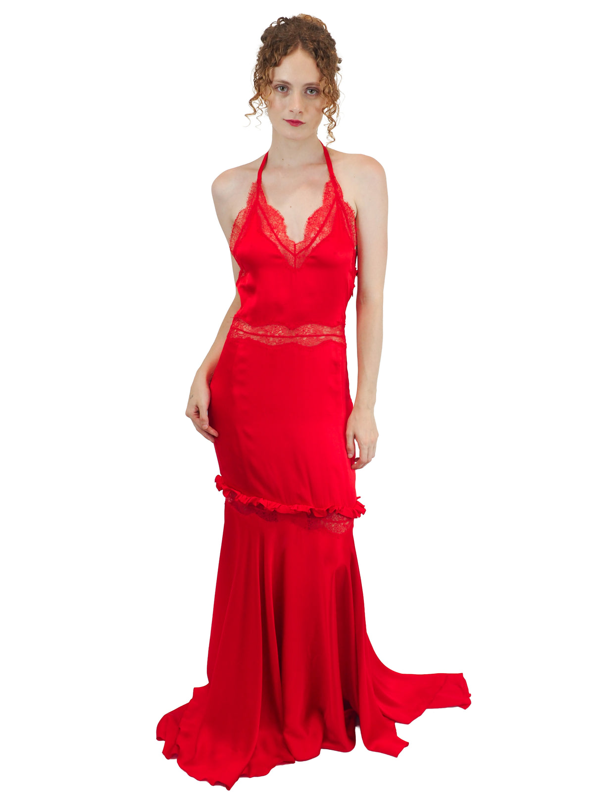 A vintage Valentino Y2K vibrant red silk halter-neck gown with lace detailing on the bodice and waist