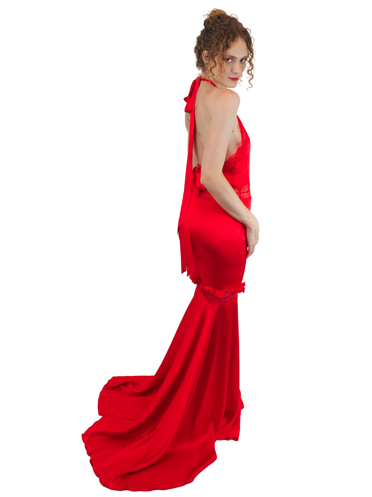 A vintage Valentino Y2K vibrant red silk halter-neck gown with lace detailing on the bodice and waist