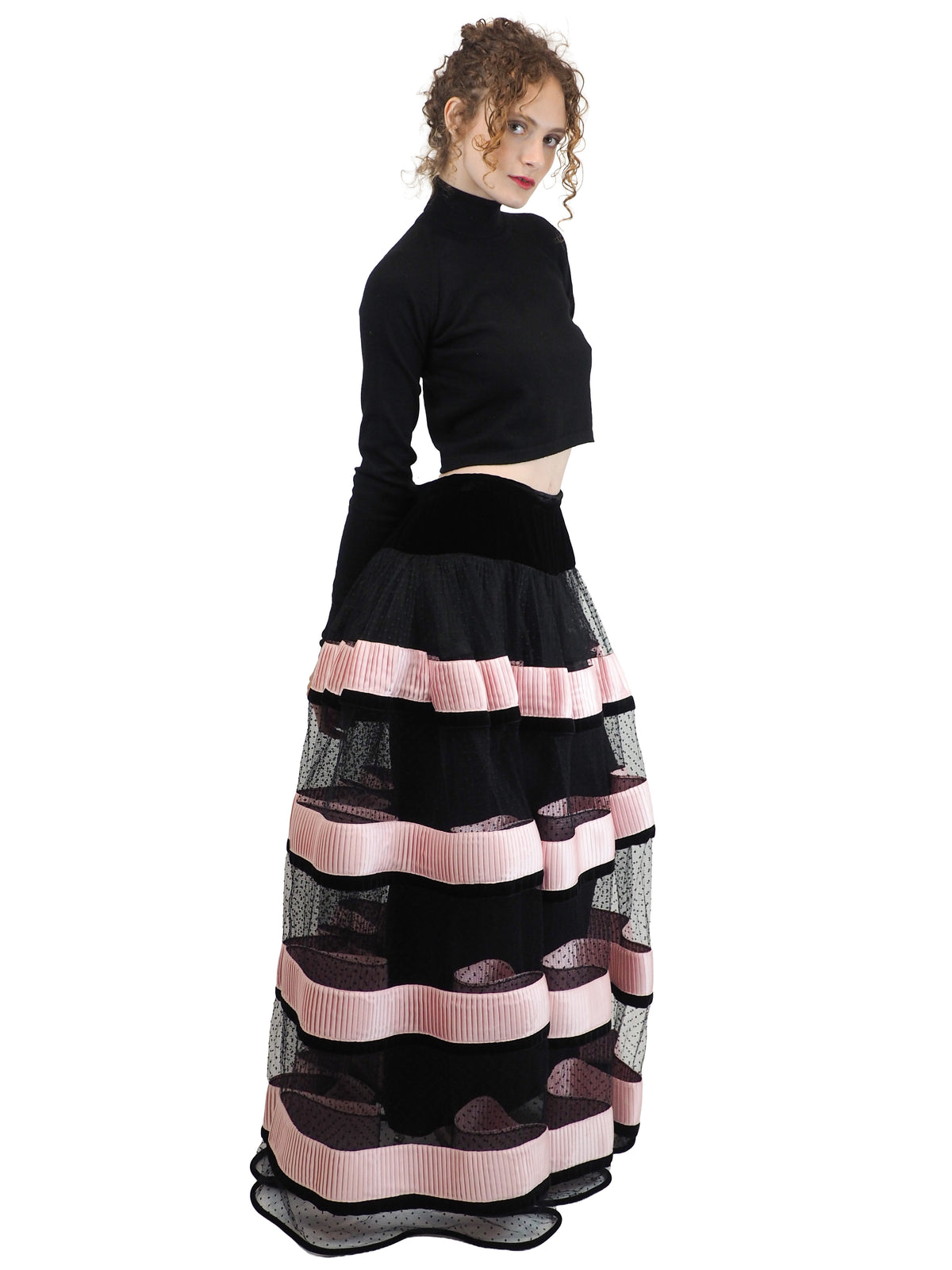 A vintage Valentino 1992/1993 long polka dotted black skirt with pink striped mesh panels