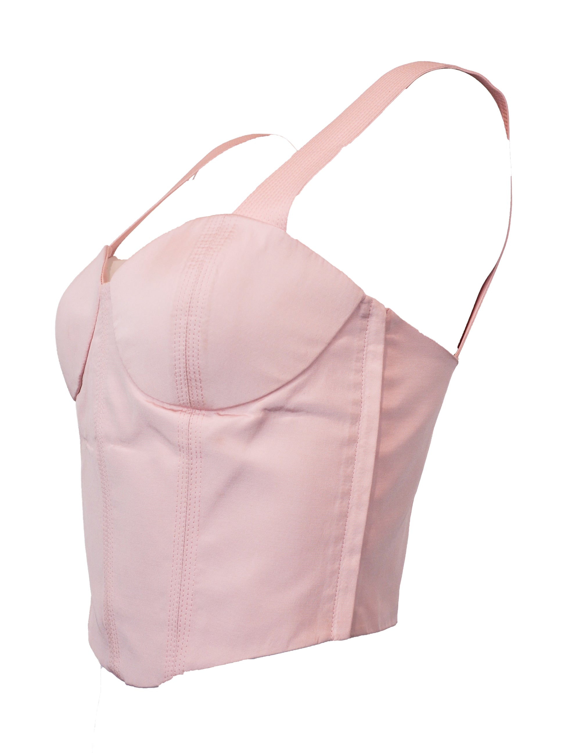 A vintage Versace 1980's light pink structured bustier top with wide shoulder straps, molded cups, and vertical seam detailing