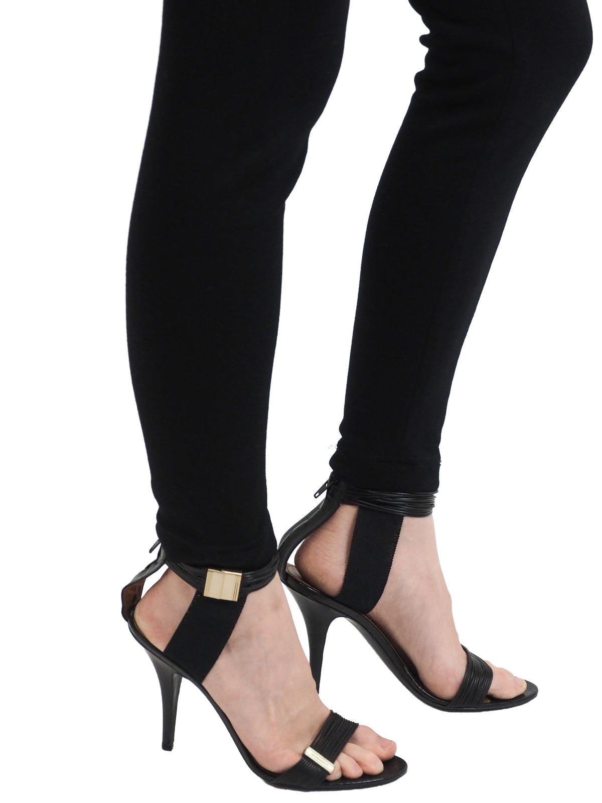 Black vintage Versace high-waisted skinny pants with flap pockets and gold medusa button details