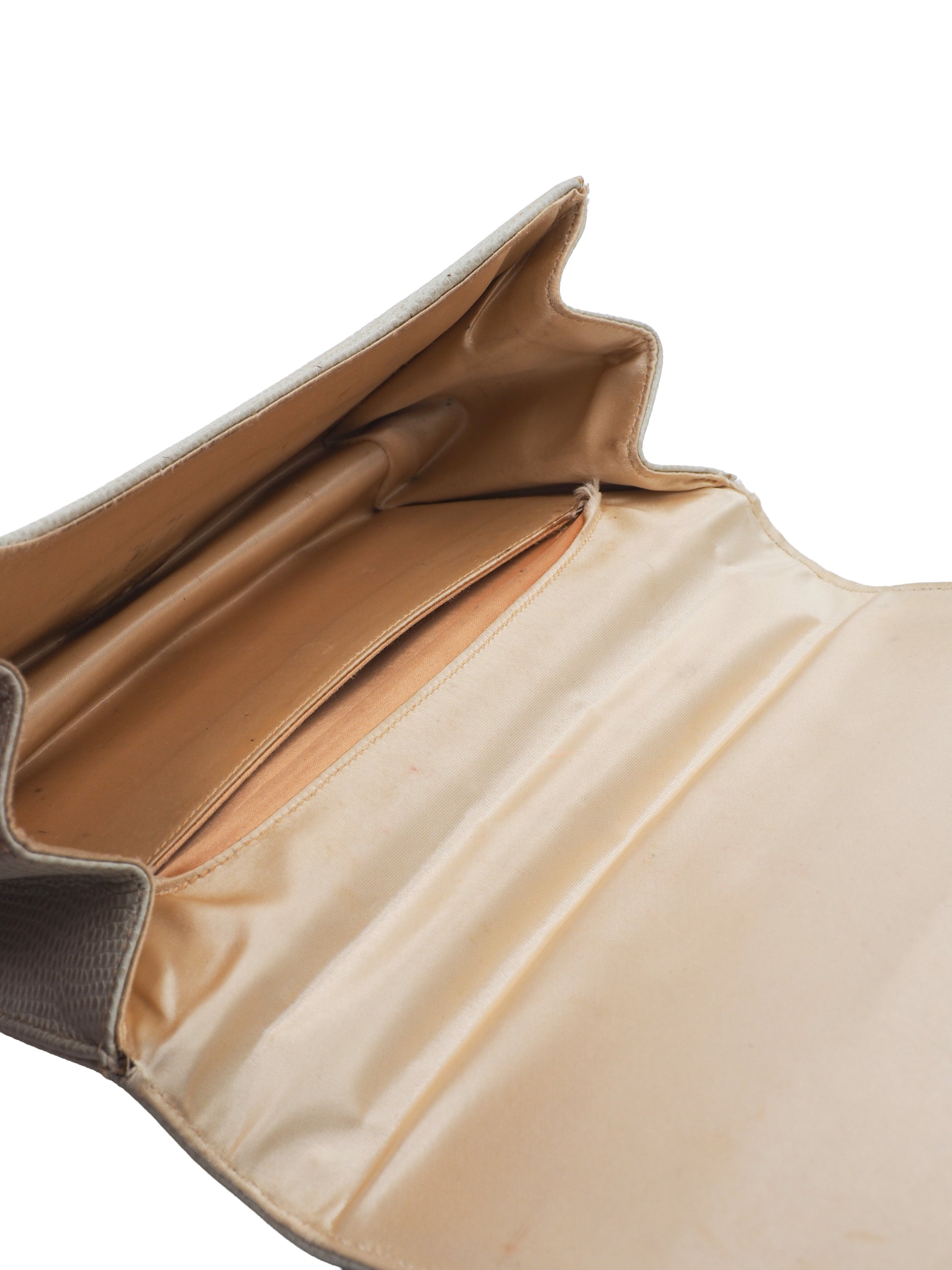 A vintage white lizard textured leather clutch handbag with a braided tan rope handle and gold-toned metal accents