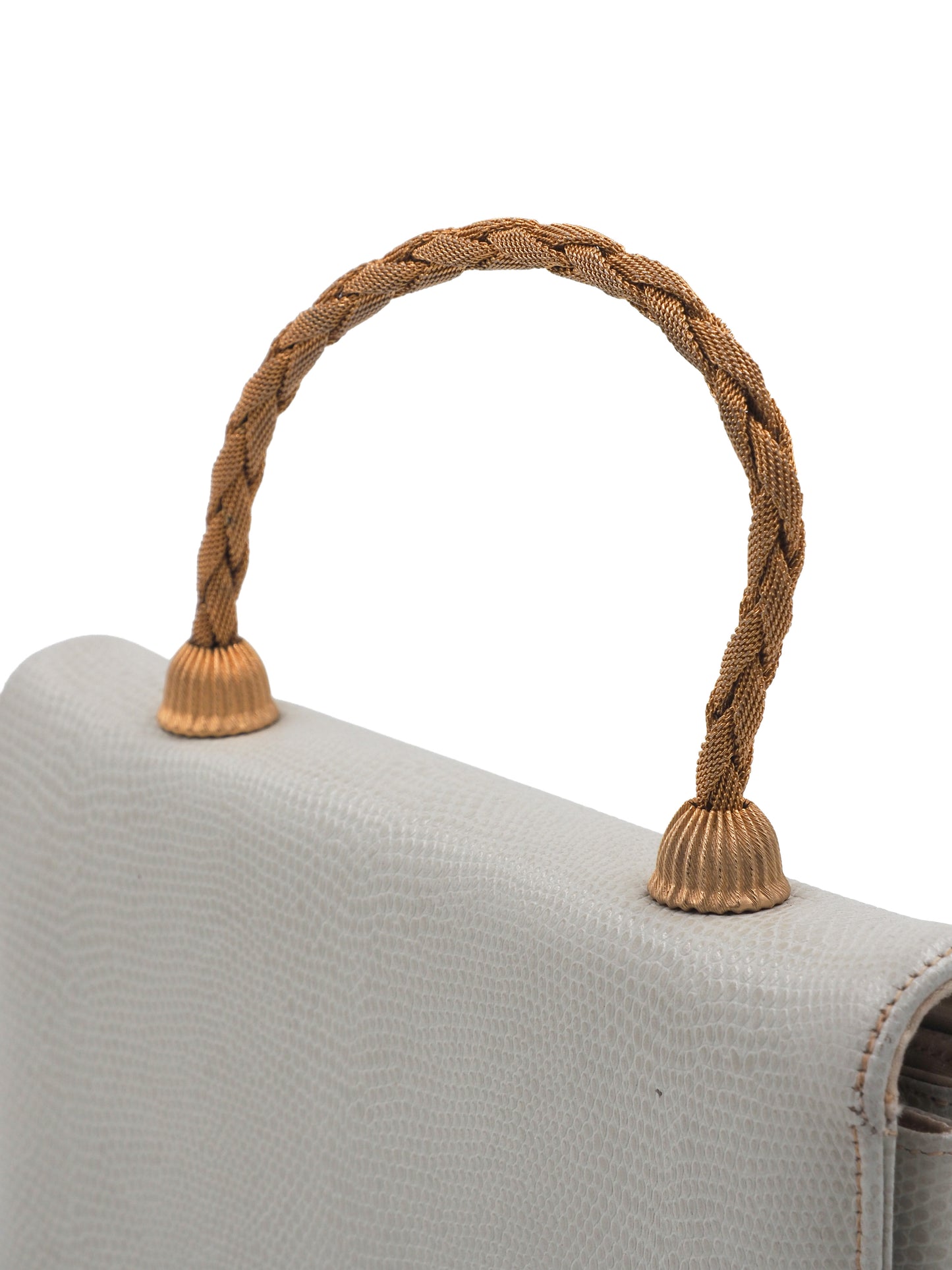 A vintage white lizard textured leather clutch handbag with a braided tan rope handle and gold-toned metal accents