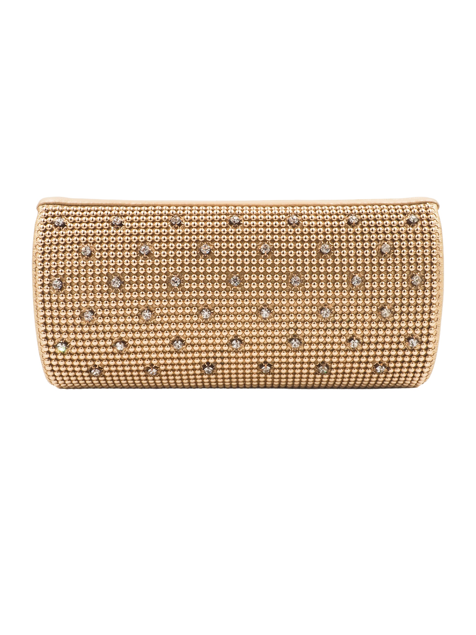 A whiting and davis gold-toned metallic clutch bag covered in a dense mesh of small rhinestones, decorated with a grid pattern of silver crystal studs