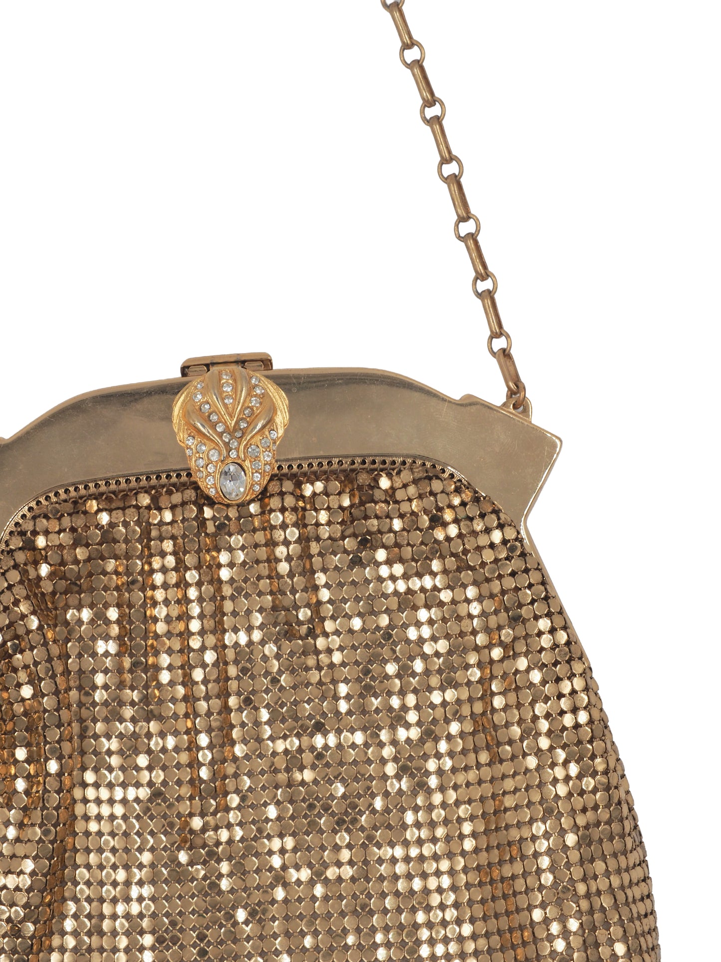 vintage whiting and Davis Close-up of a vintage gold-tone mesh clutch purse with a decorative clasp and chain strap on a white background.